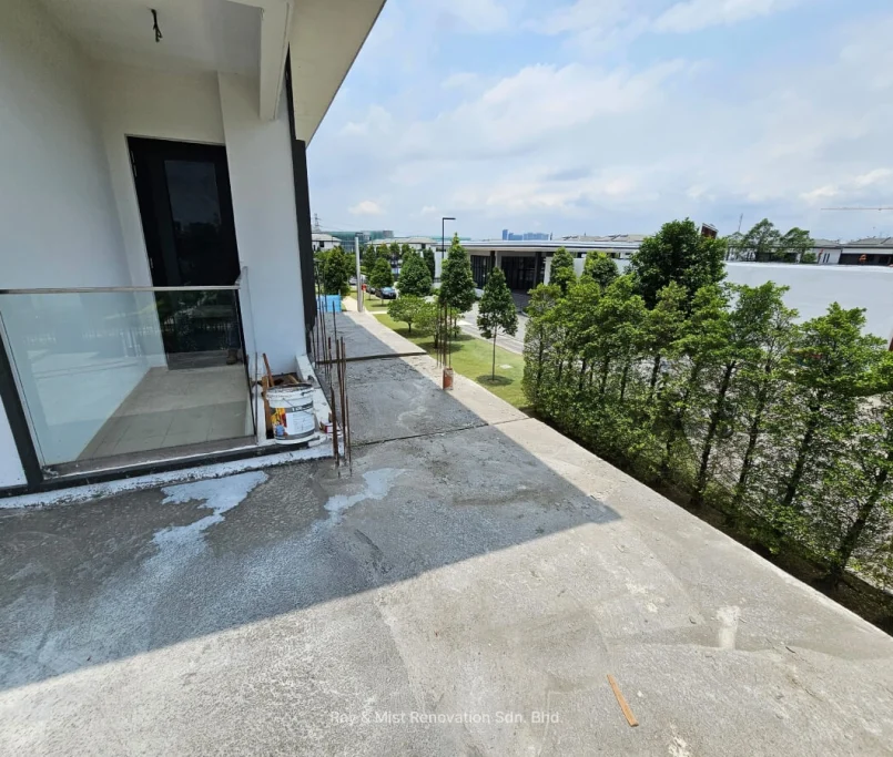 Upper floor balcony with glass railing and ongoing renovation work —Project by Ray & Mist Renovation Sdn. Bhd.