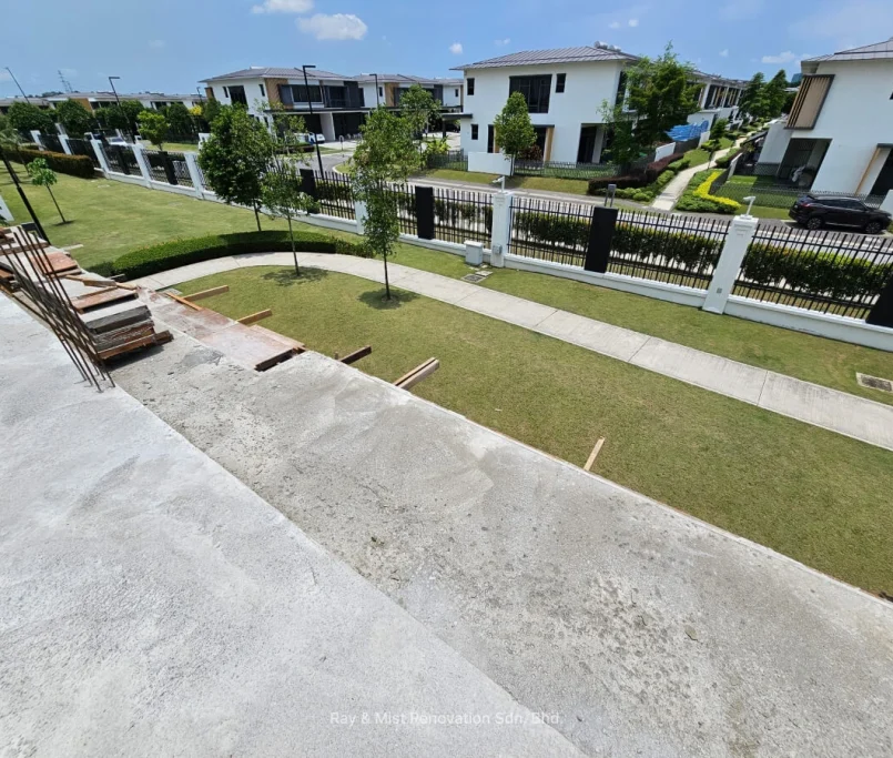 Upper floor concrete slab overlooking garden landscaping and pathway in a gated residential area —Project by Ray & Mist Renovation Sdn. Bhd.