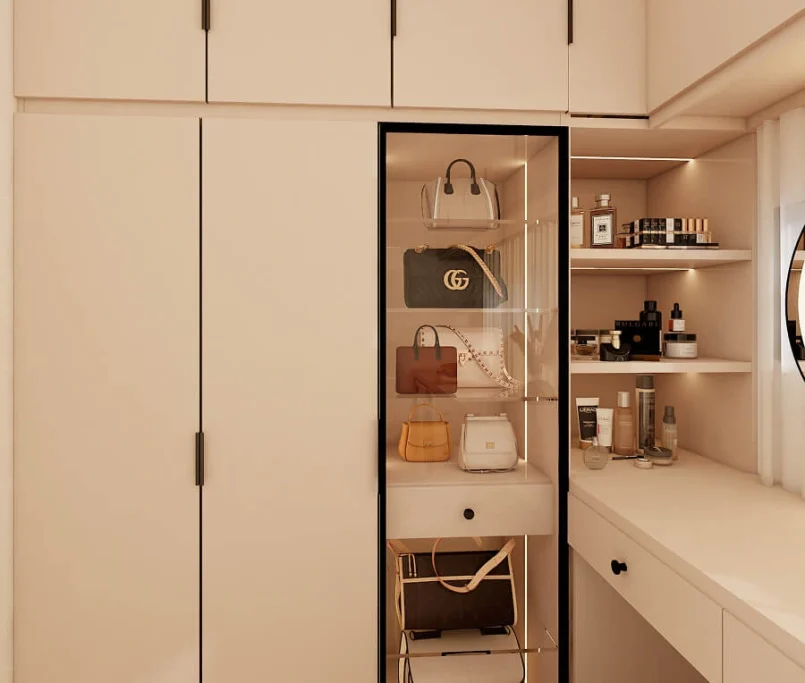 Beige built-in wardrobe with glass display for designer handbags and vanity corner —Project by Ray & Mist Design Sdn. Bhd.