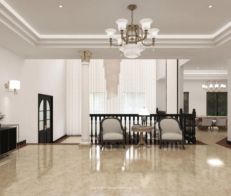 Elegant foyer with classical columns, chandelier, and seating area.