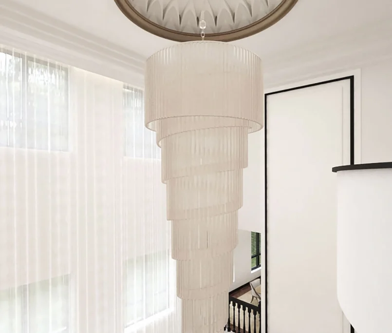 Grand spiral chandelier hanging from a sculpted ceiling medallion in a double-height living room – Ray & Mist Renovation Sdn. Bhd.