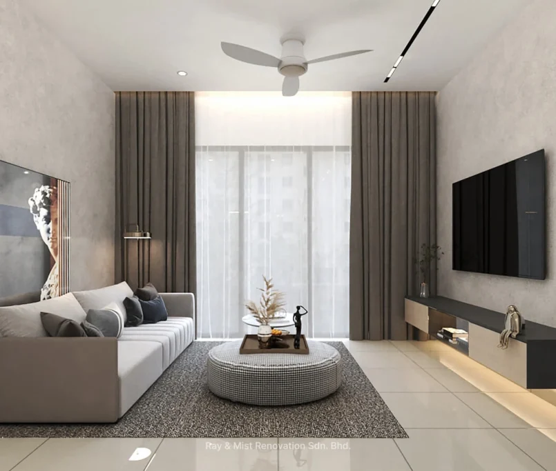 Modern living room with grey sofa, round ottoman coffee table, and wall-mounted TV — Project by Ray & Mist Renovation Sdn. Bhd.