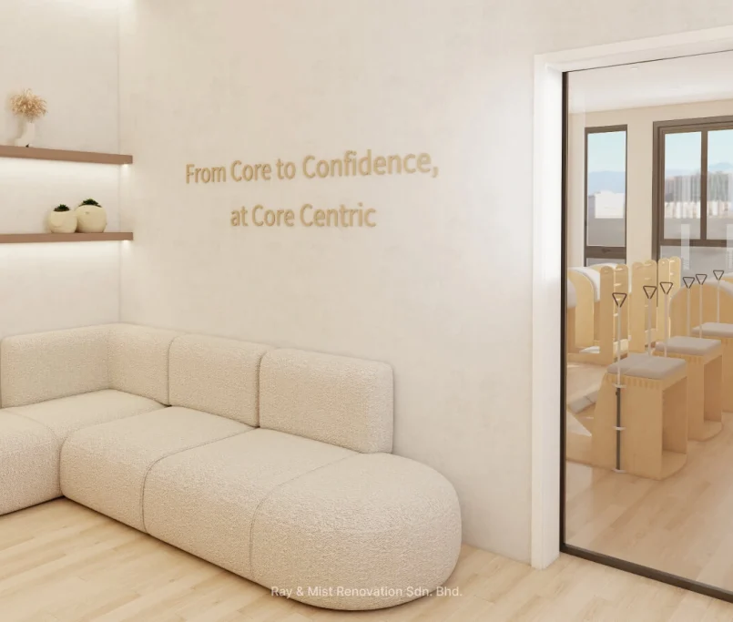 Bright reception lounge at Corecentric Pilates with curved seating, floating shelves, and brand wall slogan — Project by Ray & Mist Renovation Sdn. Bhd.