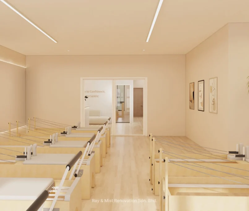 Pilates reformer studio with natural wood machines, soft lighting, and minimal artwork — Project by Ray & Mist Renovation Sdn. Bhd.