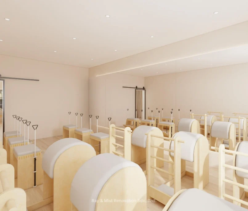 Pilates studio with spine correctors, wunda chairs, mirrored wall, and sliding barn door — Project by Ray & Mist Renovation Sdn. Bhd.