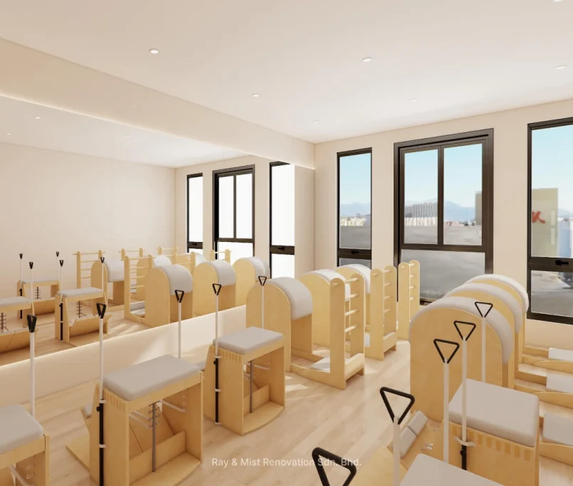 Pilates studio with spine correctors and wunda chairs, mirrored wall, and large windows with natural light — Project by Ray & Mist Renovation Sdn. Bhd.