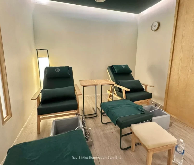 Private foot spa room with two reclining chairs, wooden stools, and foot soak basins —Project by Ray & Mist Design Sdn. Bhd.