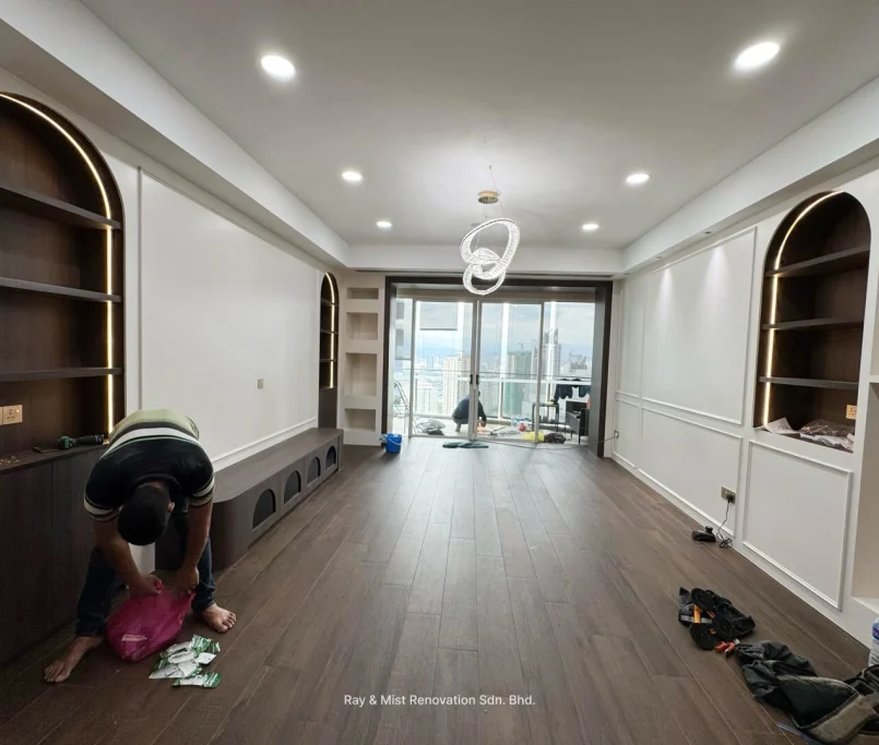 Wall-mounted cabinet system with classic white panels and walnut wood TV console — Project by Ray & Mist Renovation Sdn. Bhd.