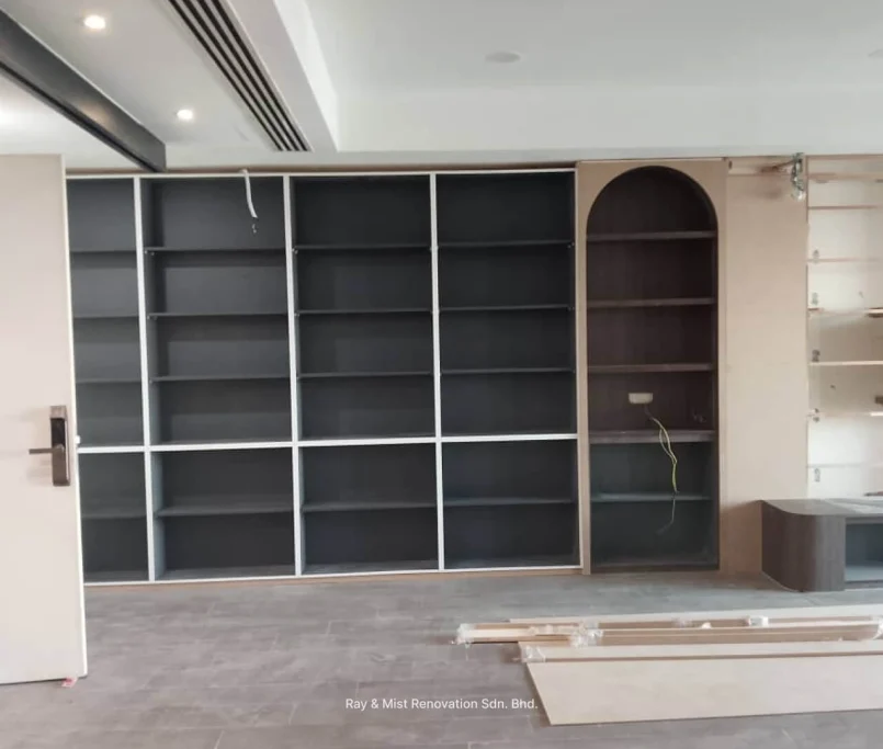 Black open shelving and arched wooden shelf unit in a living room under renovation — Project by Ray & Mist Renovation Sdn. Bhd.